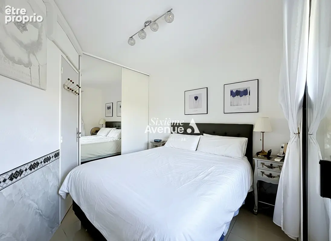 A VENDRE A MANDELIEU appartement 2 pièces en rez-de-jardin avec cave et place privative - photo 7