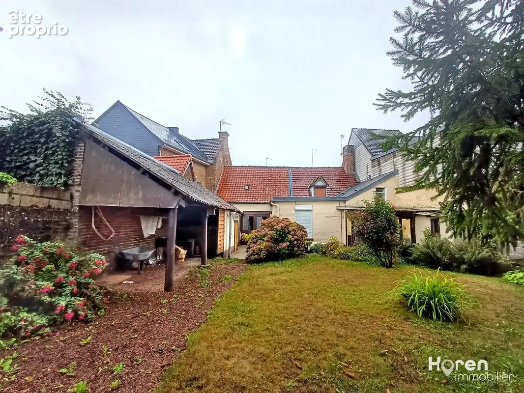 Maison centre ville a renover jardin et garage - photo 1