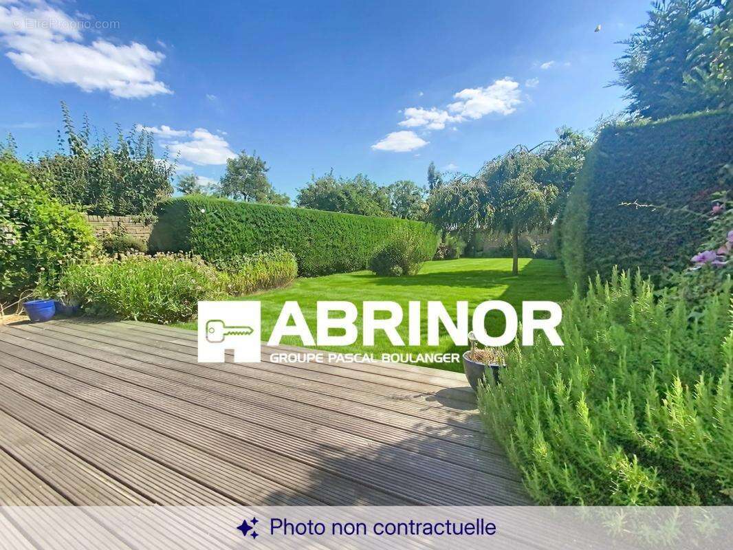 Maison individuelle - 3 chambres + bureau-mezzanine-cave-jardin-garage - photo 2