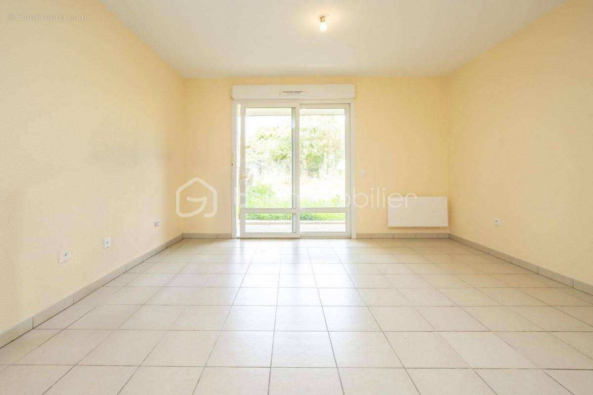 Appartement en rez-de-jardin avec parking - photo 2