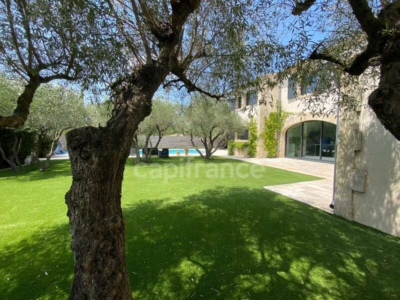 À SAINT MAXIMIN (30) Splendide propriété de 280 m², à 5 min d’Uzès proche de toutes commodités, sur un terrain clos et arboré d’ - photo 4