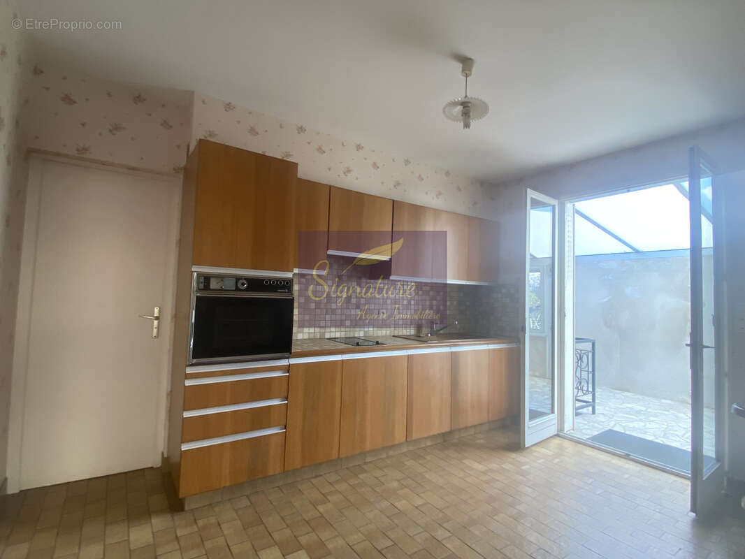 Maison de ville avec grand terrain - photo 4