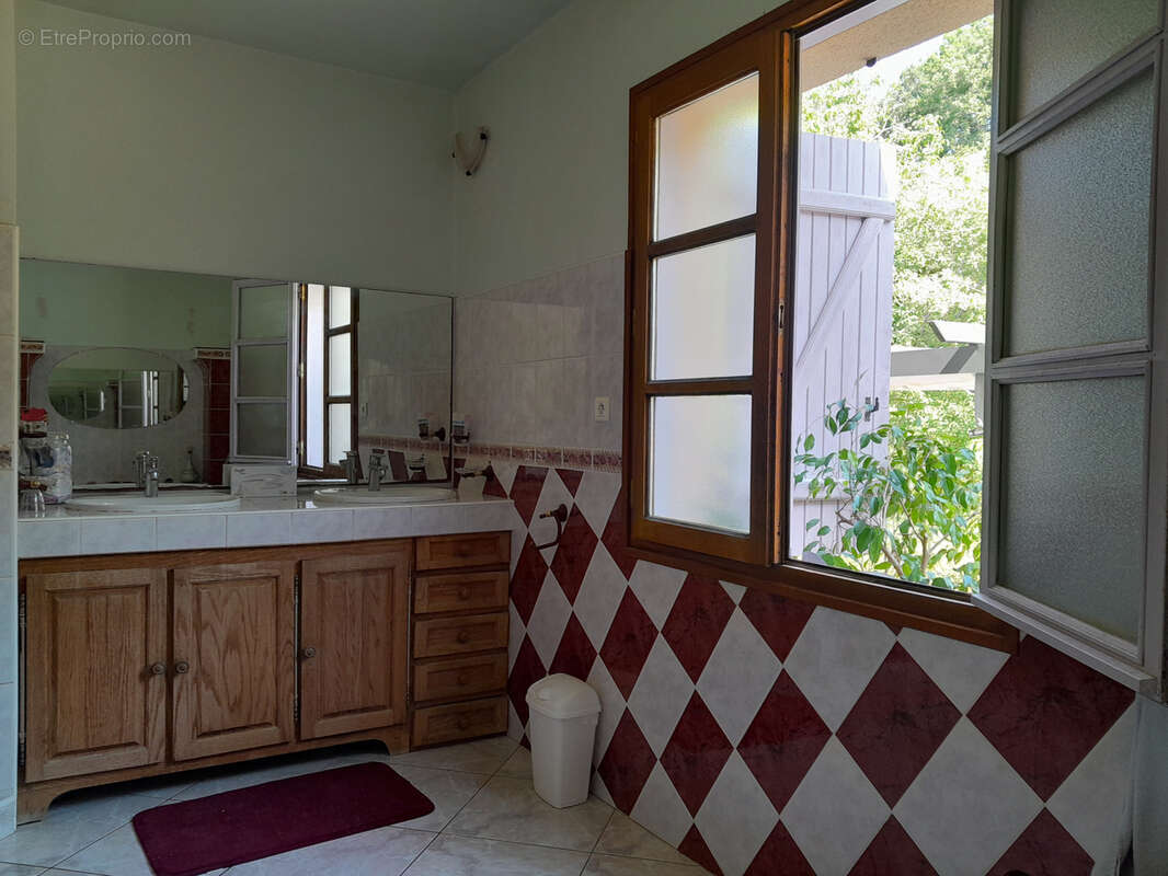 Maison de plain pied sur sous sol complet.. - photo 13