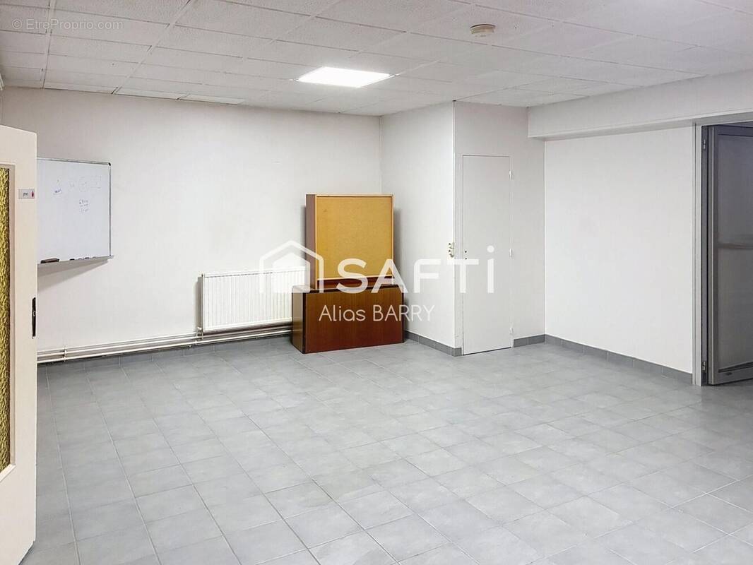 Photo 1 - Commerce à LENS