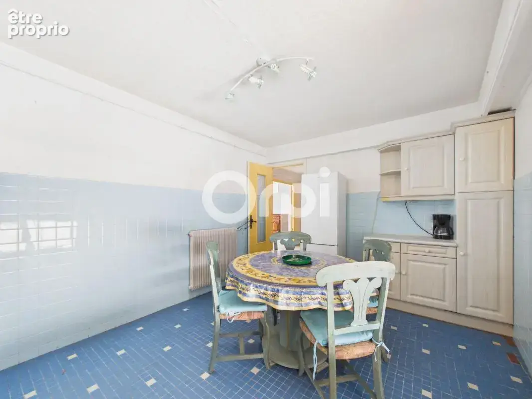 Appartement t3 - 86m2 - stationnement/ cave - centre ville - traversant - dernier étage - photo 6