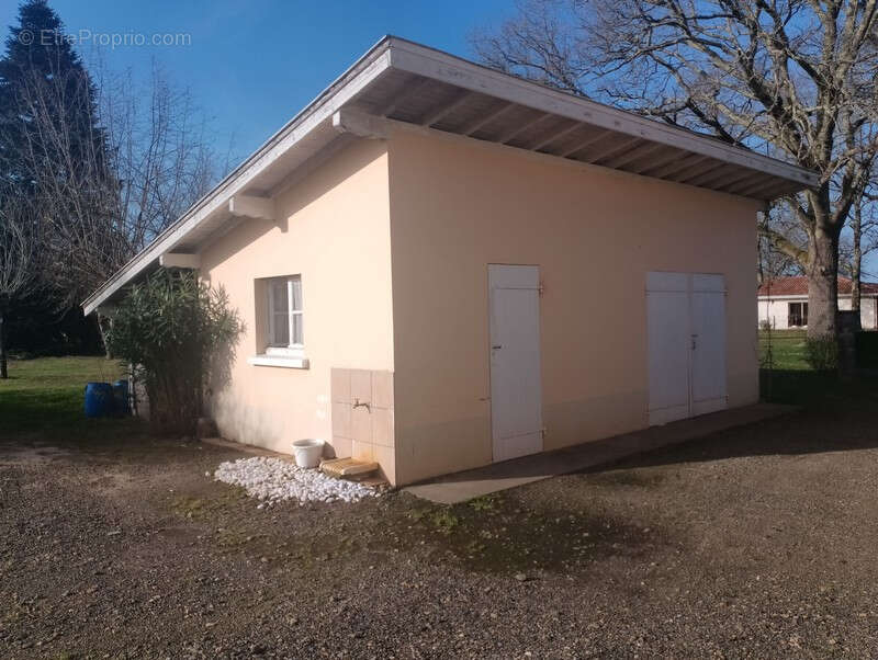Maison t4 de plain pied + dépendance - photo 5