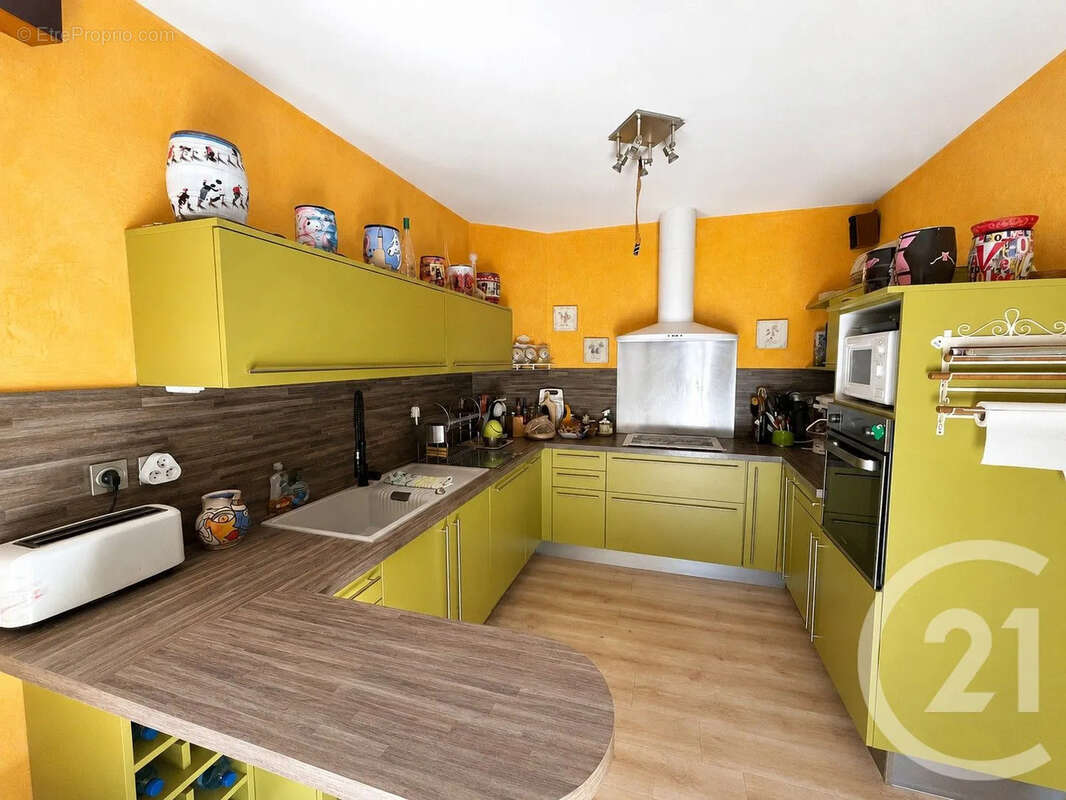 Maison 140 m² à Saint-Drezery  - photo 10