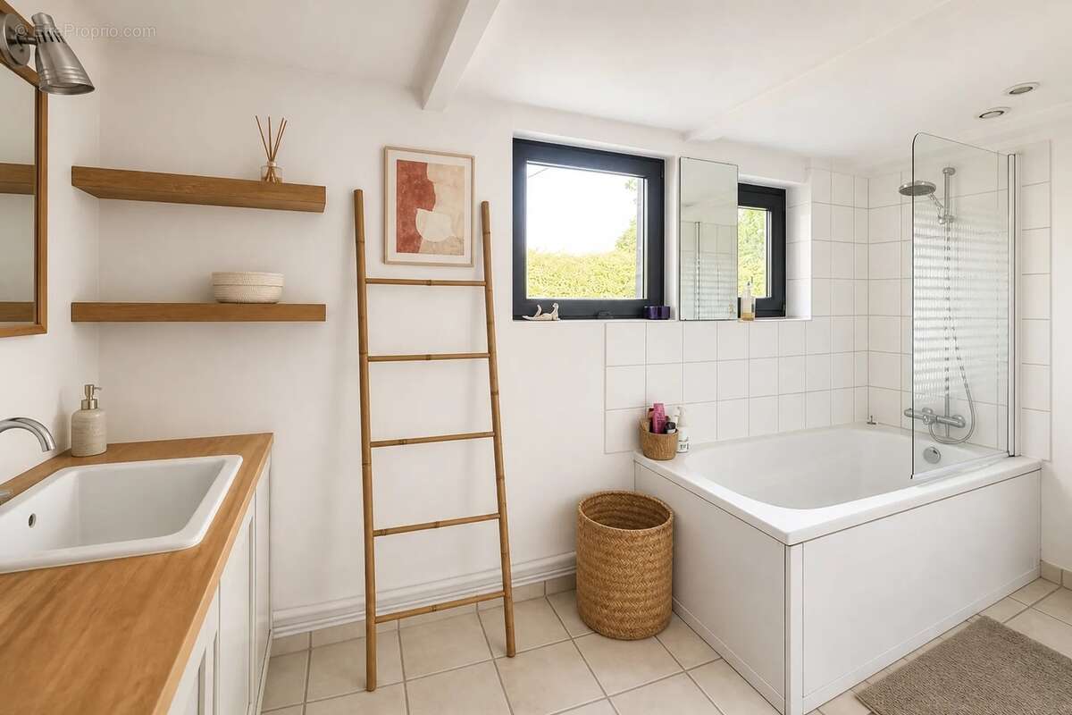 Maison familiale en pierres de caractère – 205 m² – 4 chambres – Jardin de 1 000 m² – Bréhan - photo 3