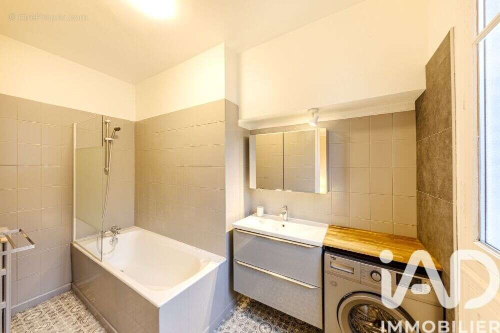 Photo 9 - Appartement à COURBEVOIE