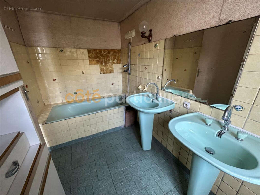 Maison à AGON-COUTAINVILLE