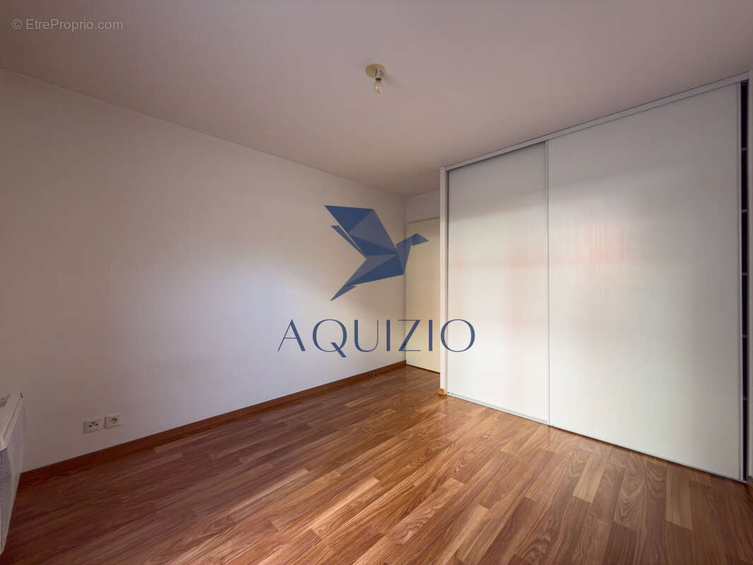 Appartement T3 en rez de jardin avec grande terrasse - photo 12