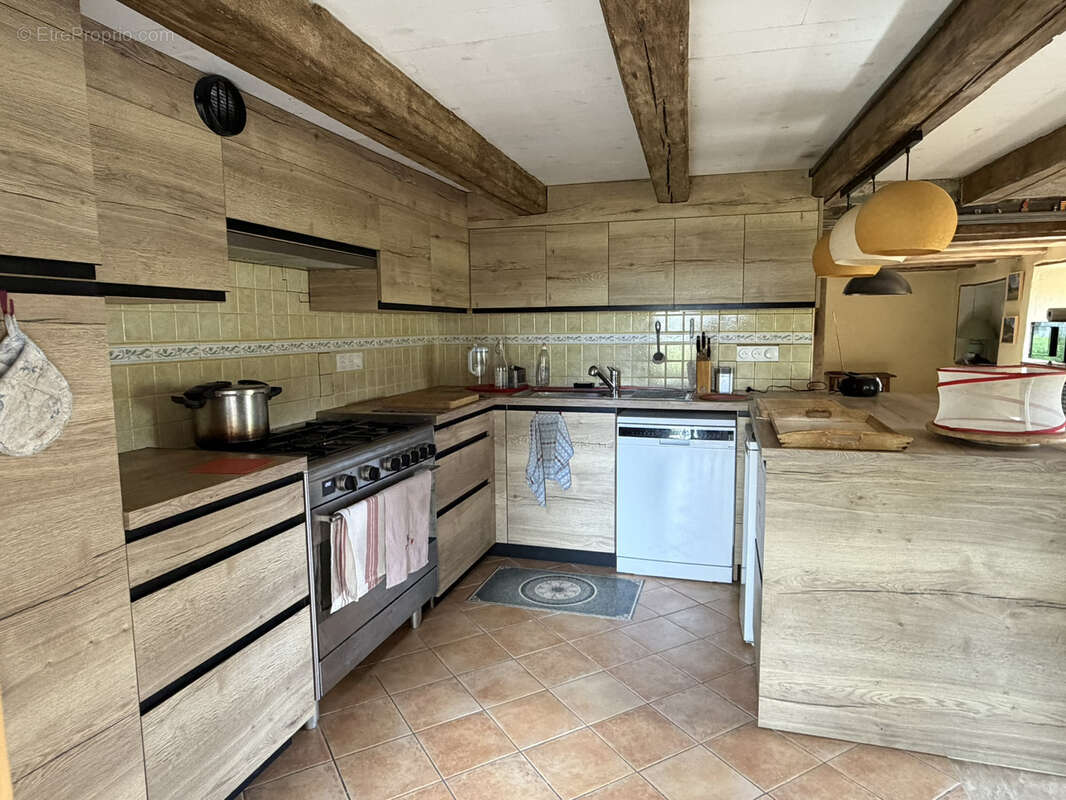 Maison à AUGEROLLES