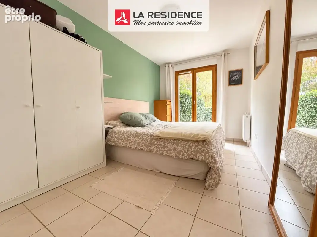 Appartement 4 pièces 83 m² à vendre à Le Mesnil-Saint-Denis (78320) - photo 4