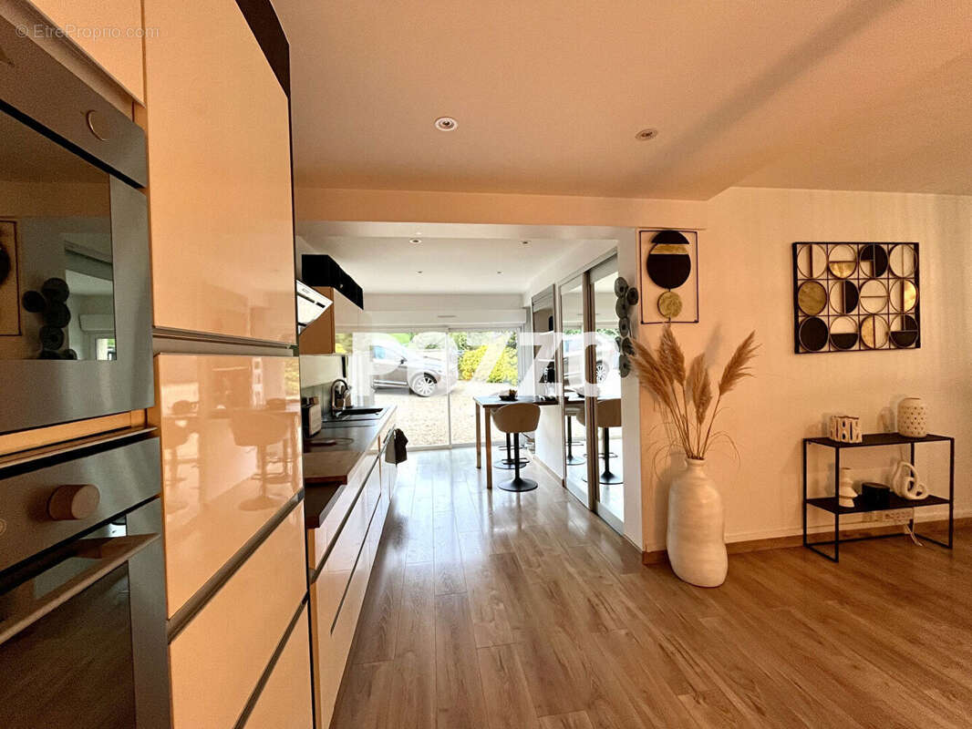 Maison Saint Planchers 6 pièce(s) 110 m2 sur 845m² - photo 6