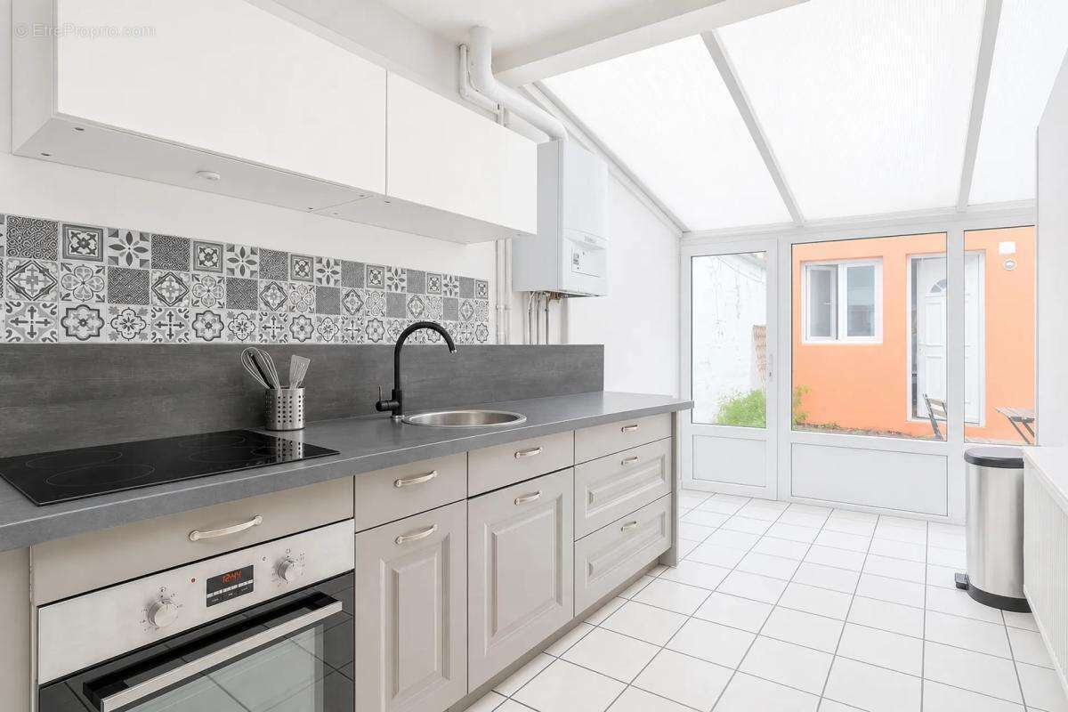 Maison louée 5 pièces 97 m² à Tourcoing - photo 7