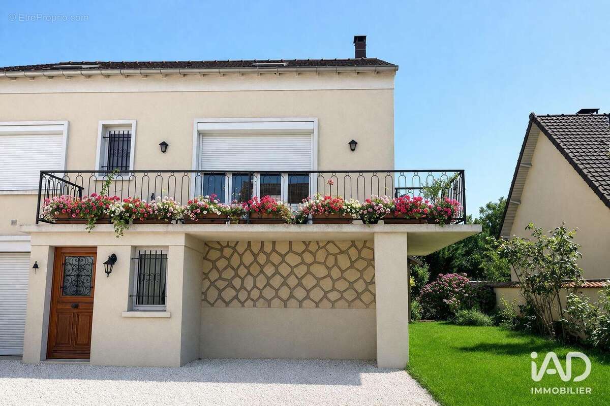 Photo 2 - Maison à BRIE-COMTE-ROBERT