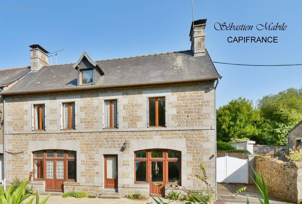 Maison à COGLES