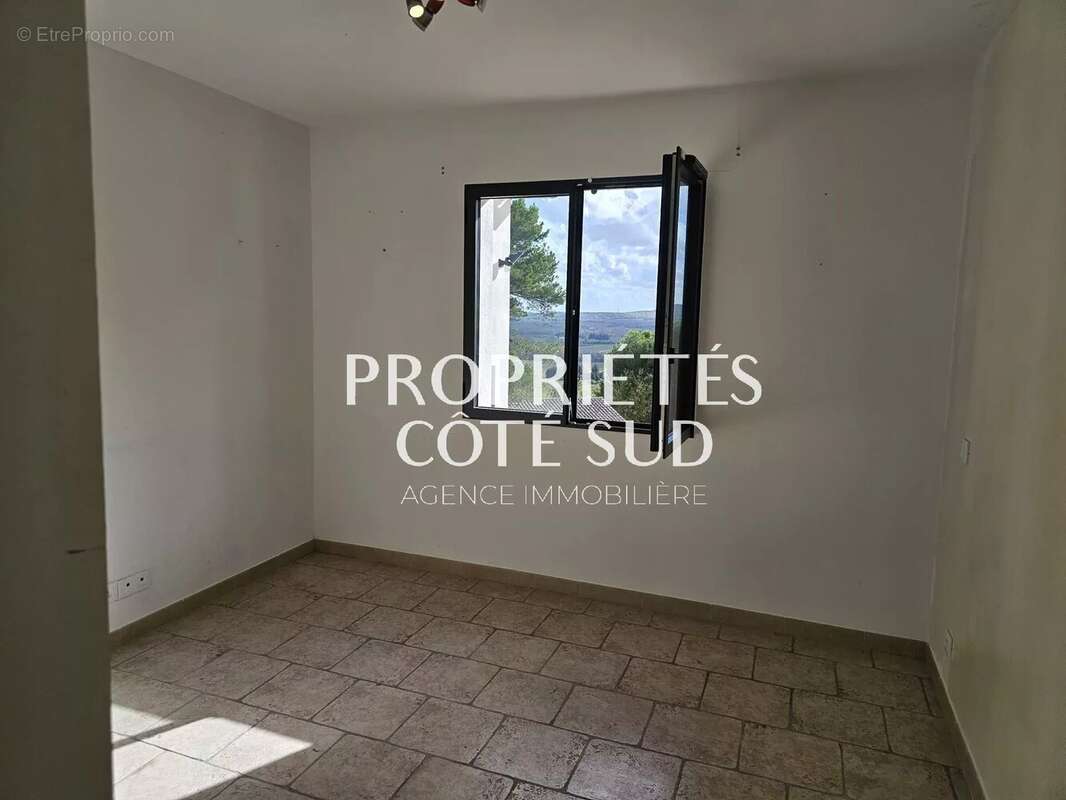 Maison à LAUDUN-L&#039;ARDOISE