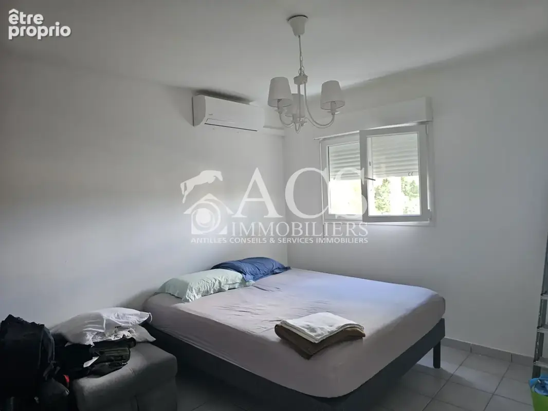 T2 en etat locatif avec places stationnement - photo 3