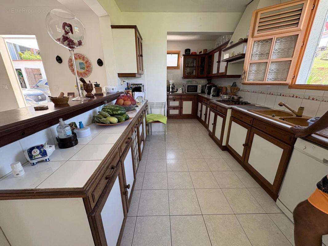 Maison 11 pièces 105 m² à vendre à Petit-Bourg (97170) - photo 2