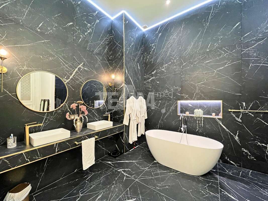 Appartement Haussmannien rénové d'exception - photo 2