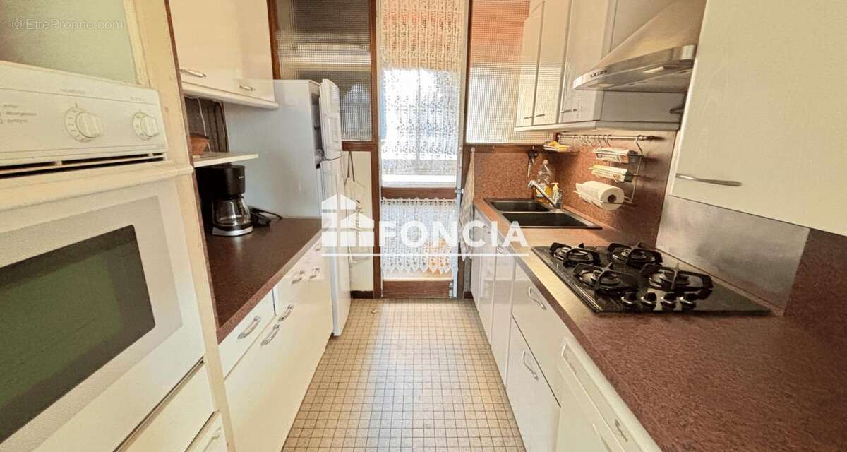 APPARTEMENT T3 avec cave et parking - photo 5