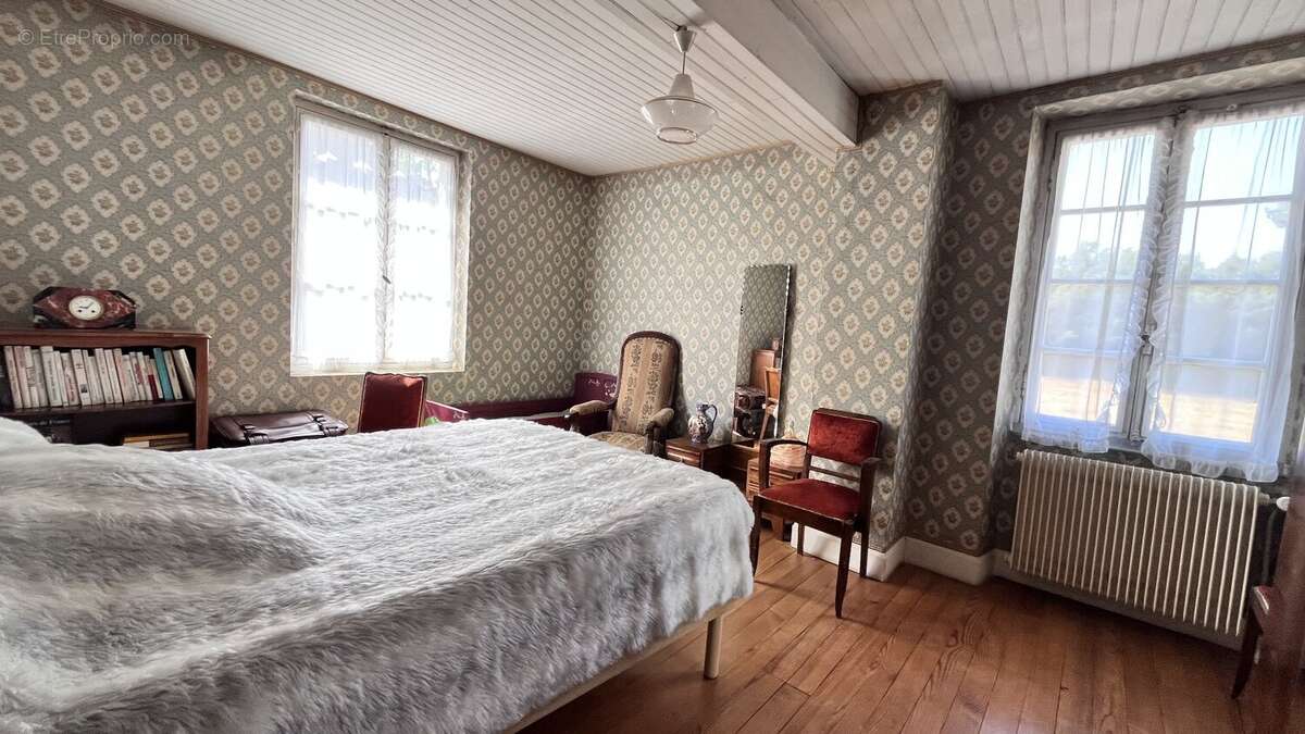 Beaucoup de potentiel à développer pour cet ancien corps de ferme des années 1850 - photo 8