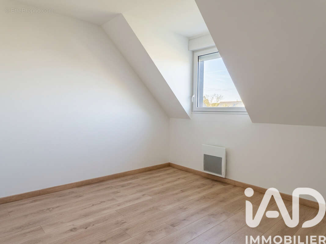 Maison 93 m² à Breteil  - photo 5