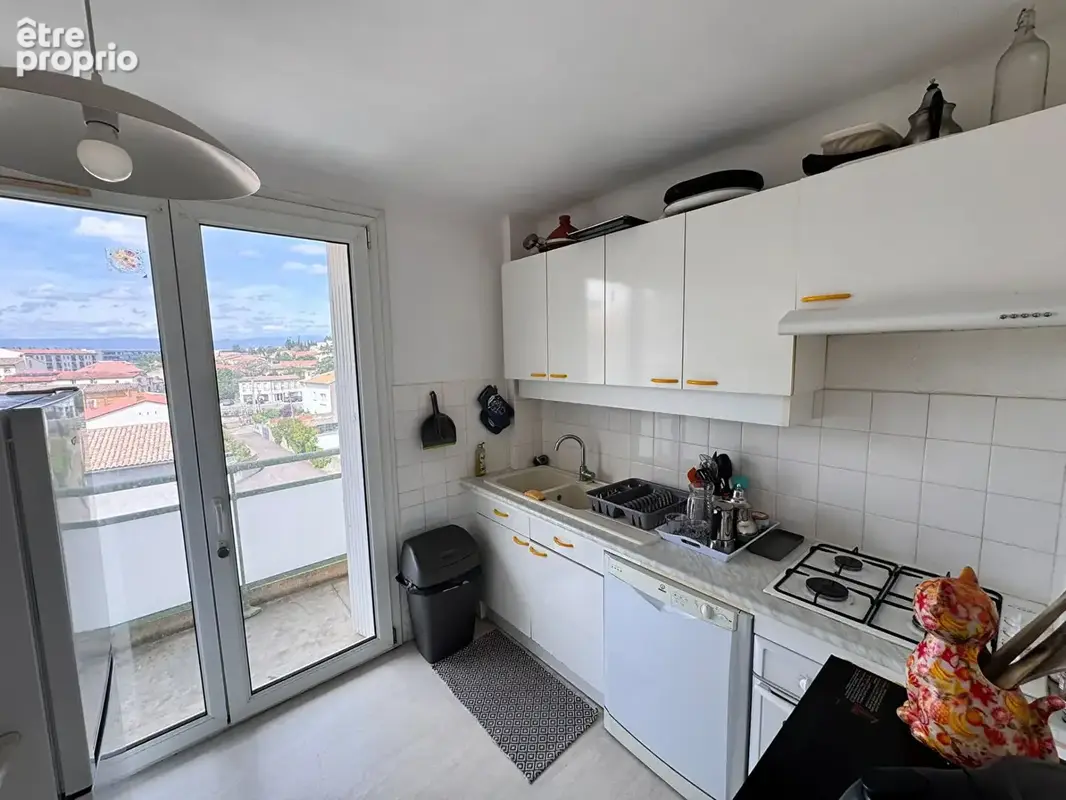 Carcassonne - appartement traversant 76 m² - dernier étage - balcons - parking privatif - photo 4