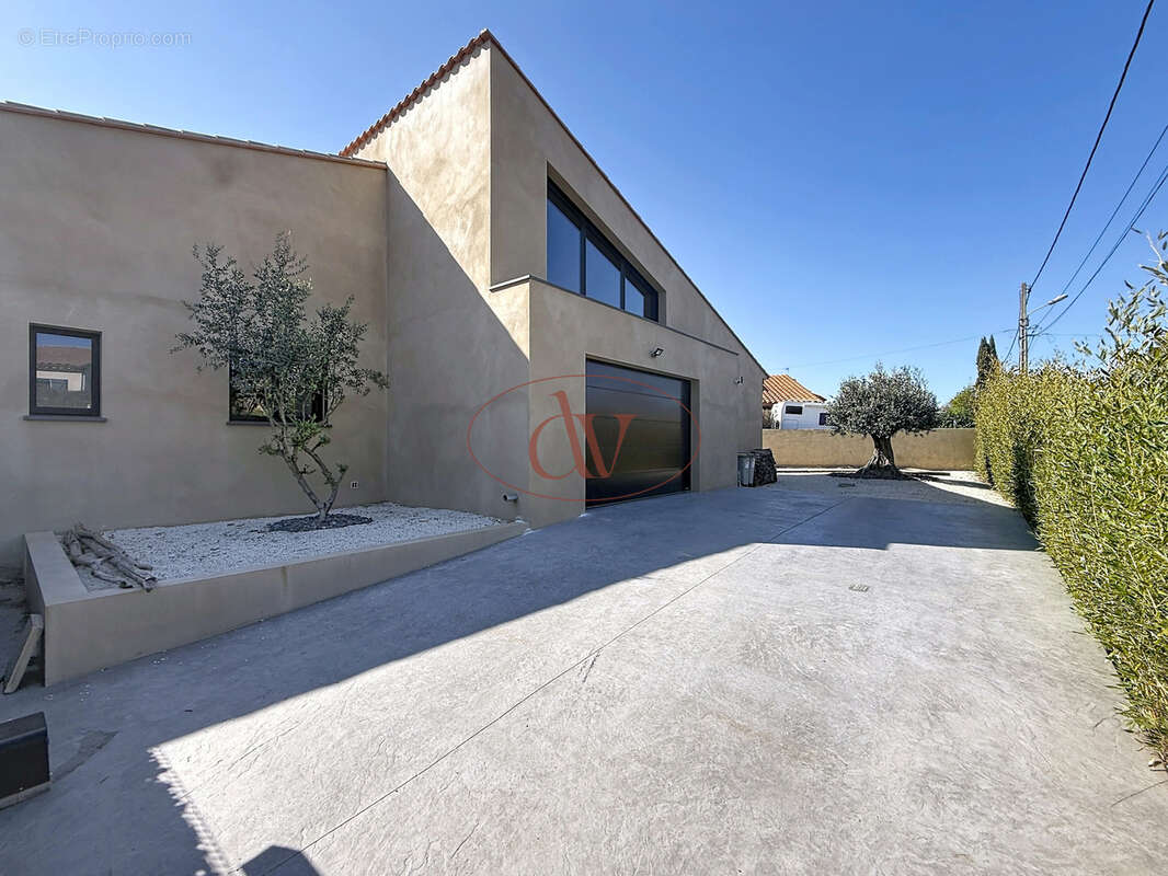 Superbe villa contemporaine 4 faces - plain pied - photo 19