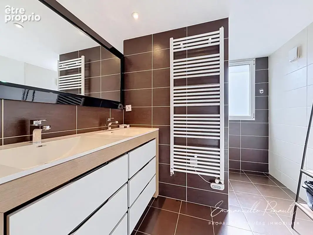 Vannes Maison familiale de 137 m², 4 chambres, jardin clos et vie de plain-pied - photo 13