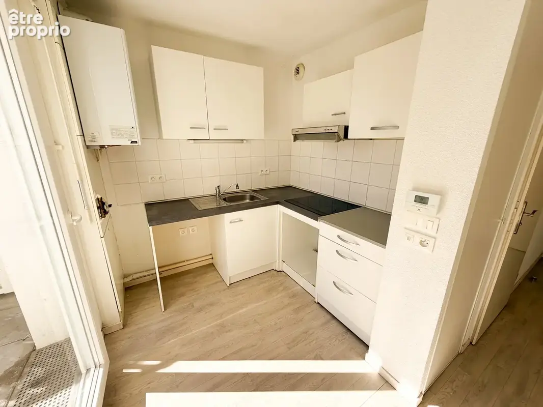 Appartement T3 en duplex avec terrasse - photo 4