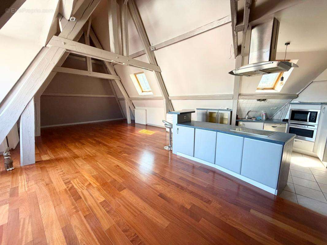 Appartement de caractère – 3 chambres – cave - centre ville - photo 12