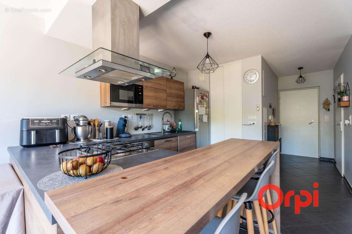Appartement en rez-de-jardin avec un garage - photo 6