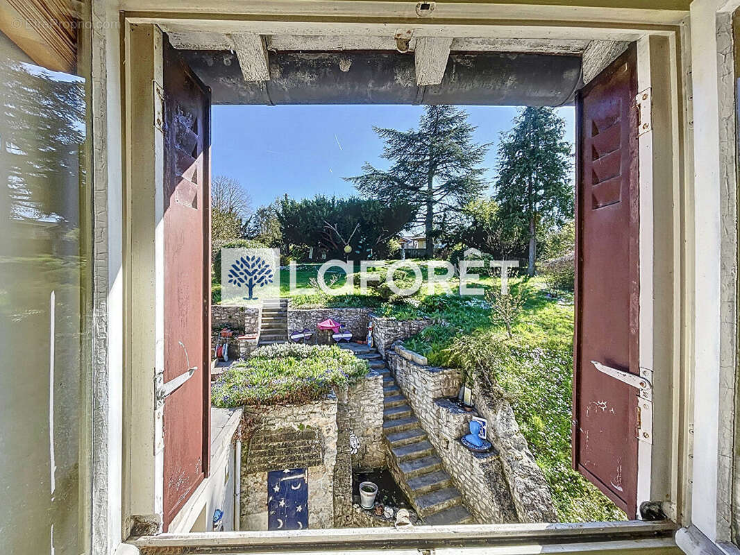 Maison à THIVERVAL-GRIGNON