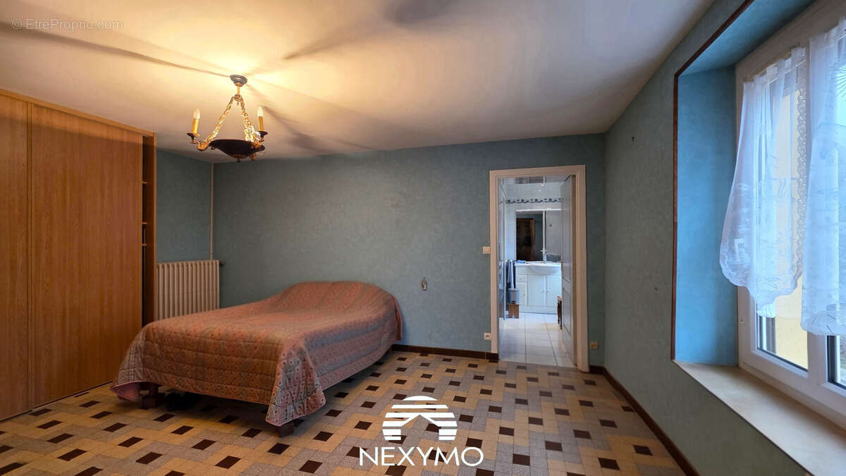 Maison à PARIGNE-L'EVEQUE