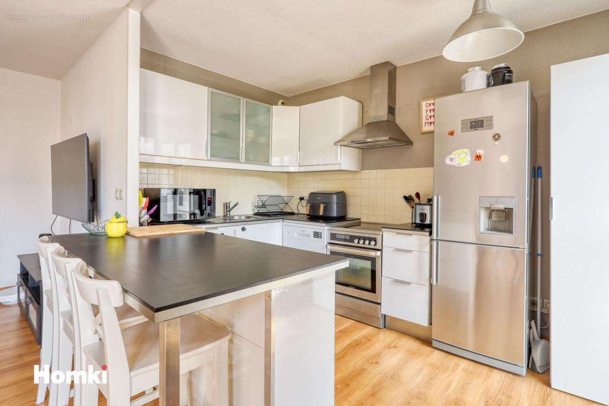 Appartement T3 de 62 m² à Toulouse 31400, Rue Guglielmo Marconi - photo 4