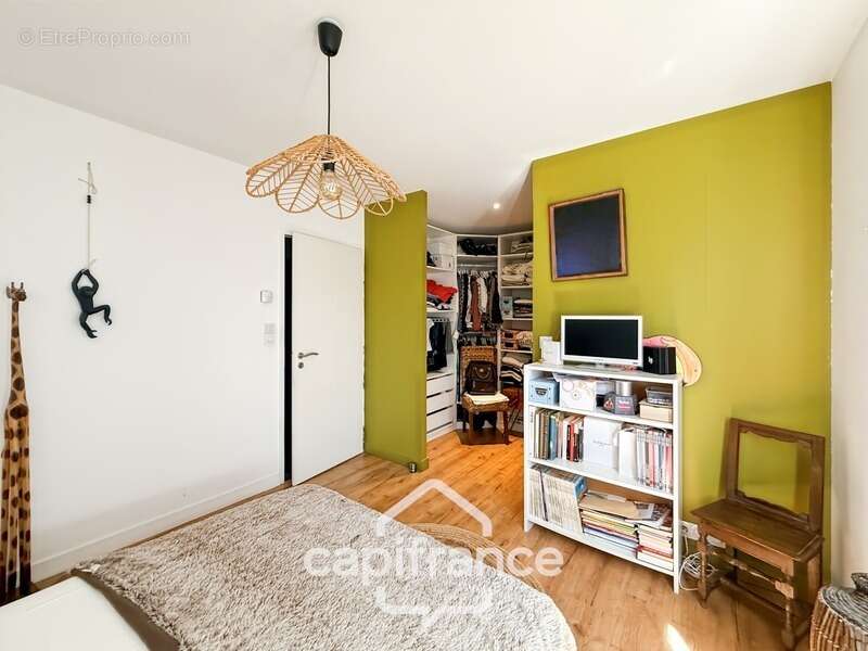 Maison contemporaine de plain-pied de 160 m² – 4 chambres – Véranda de 27 m² avec spa – Double garage – Carport – Noyal-Pontivy - photo 18