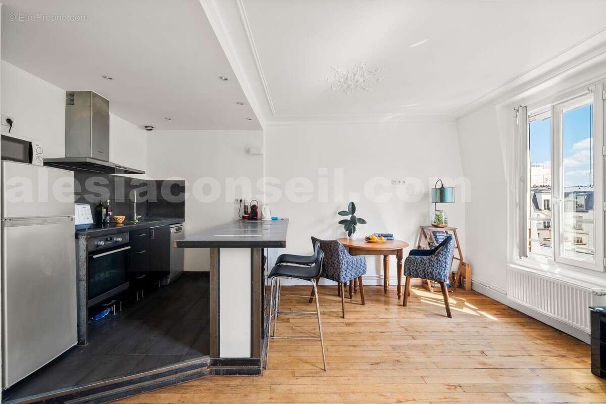 Photo n°8 - Appartement à PARIS-14E