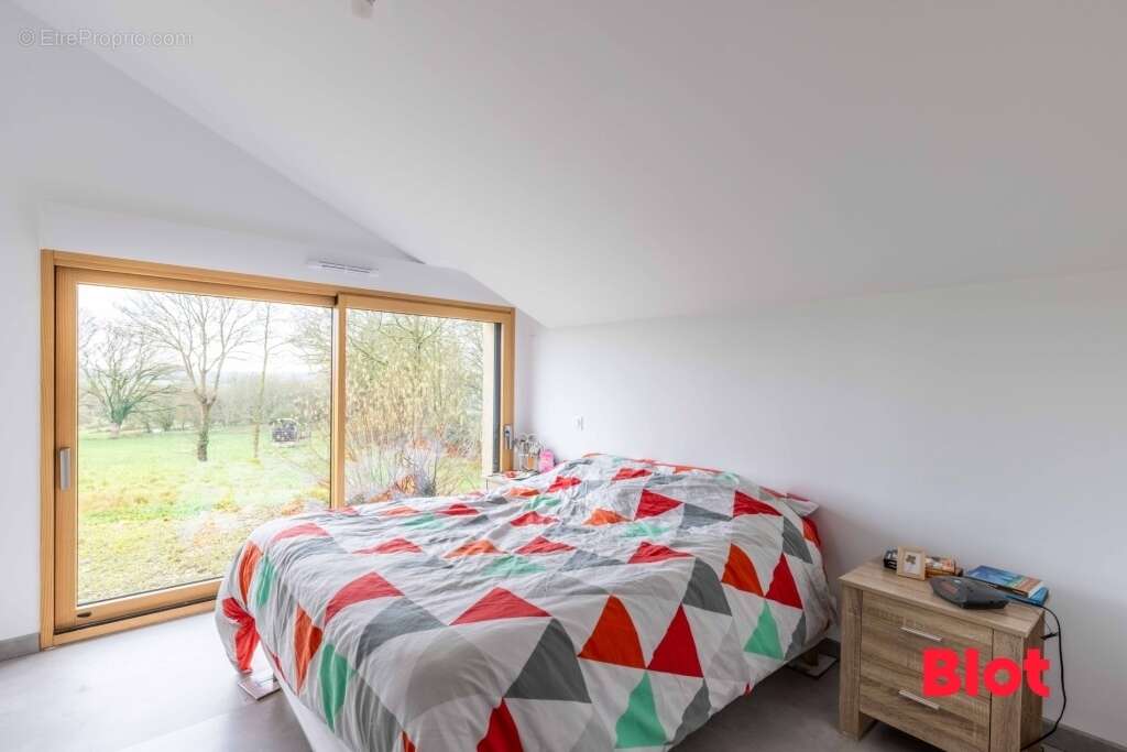 Maison à LA BOUEXIERE