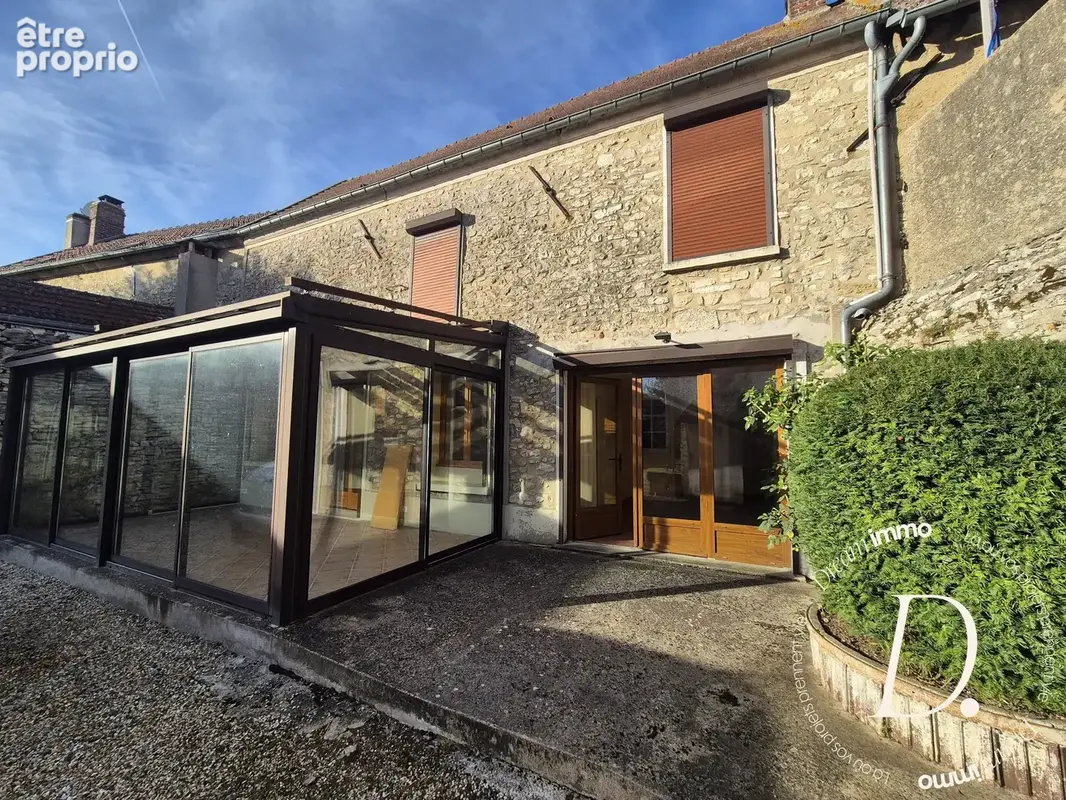 Maison avec véranda
