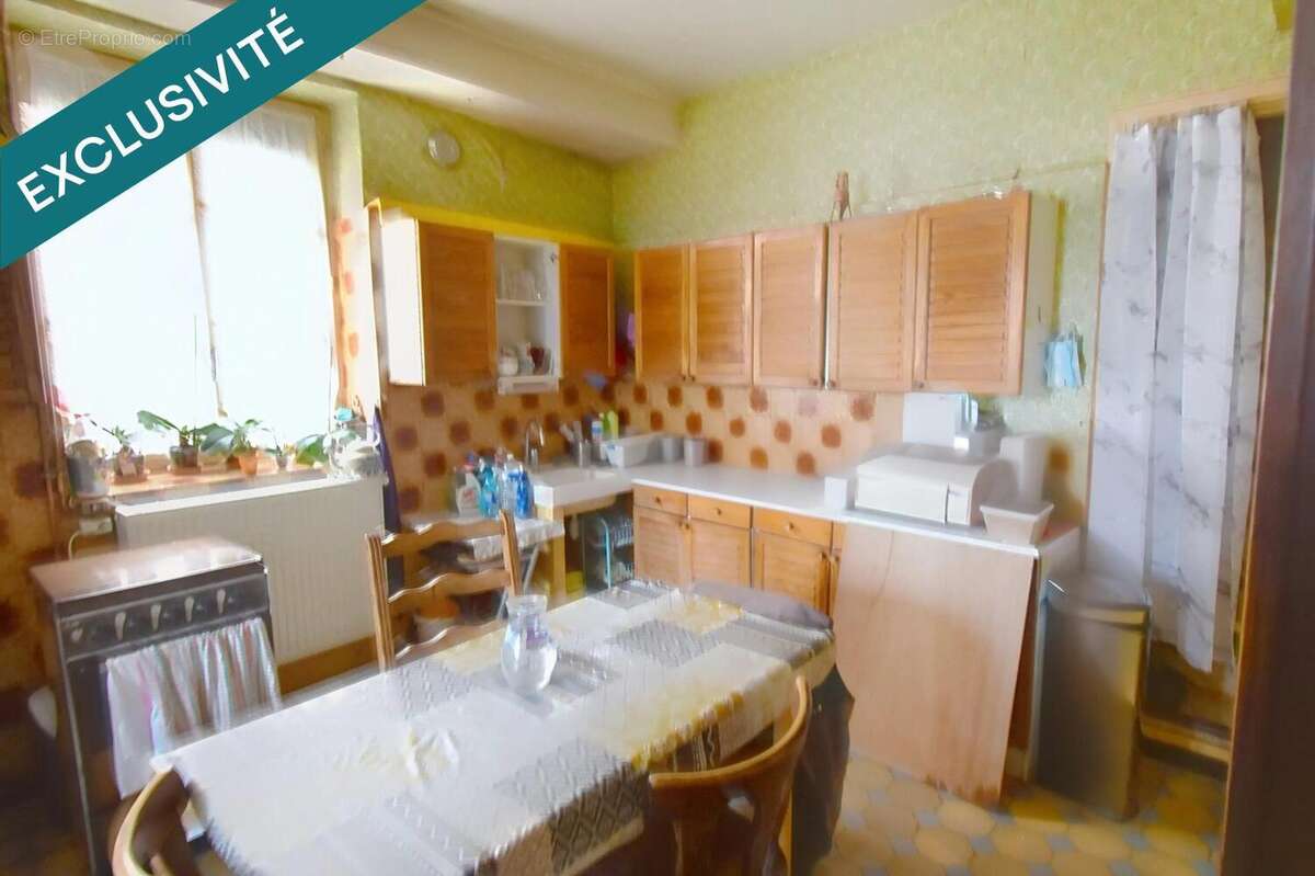 Photo 2 - Maison à ROMANECHE-THORINS