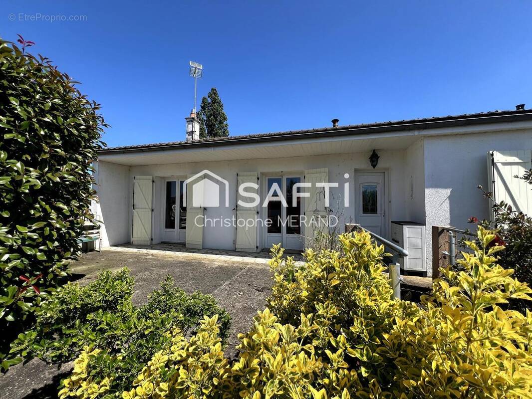 Photo 1 - Maison à DANGE-SAINT-ROMAIN