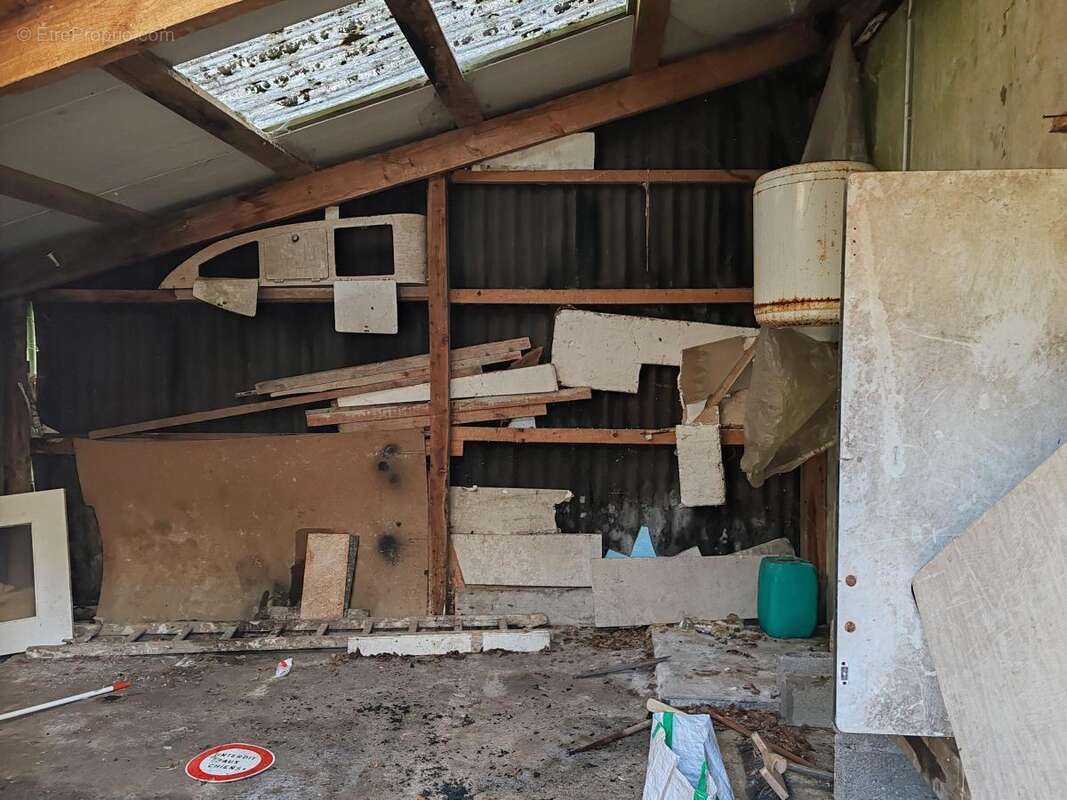 Maison 55 m² à Le Cloitre-Saint-Thegonnec  - photo 9
