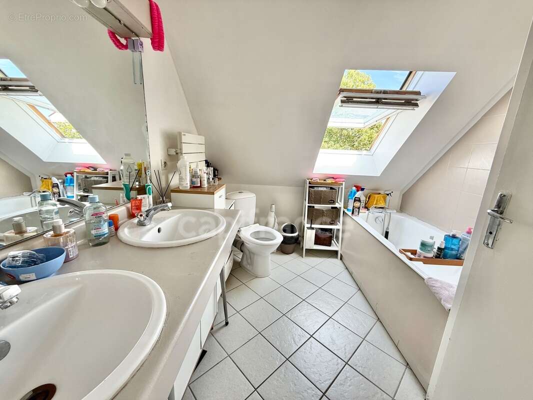 SOISY-SOUS-MONTMORENCY – Maison familiale 4 chambres avec jardin, garage et dépendance - photo 11