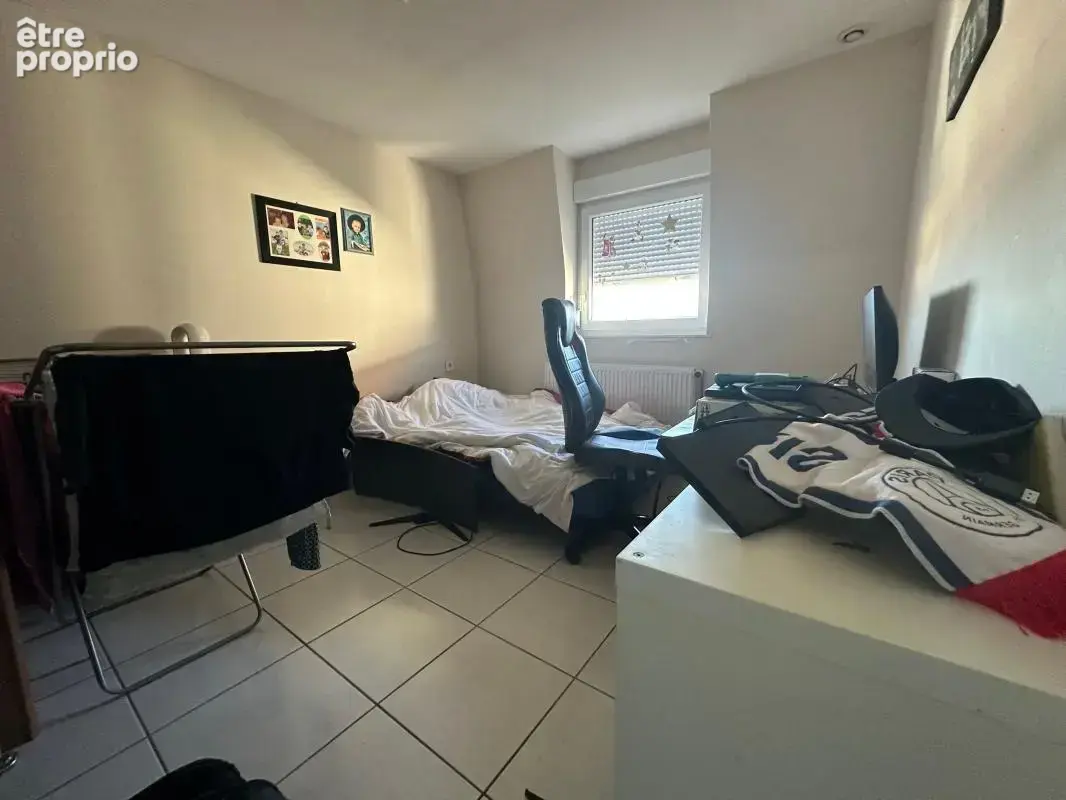 Investir sur Wittenheim-proche Mulhouse T3 loué avec garage - photo 11