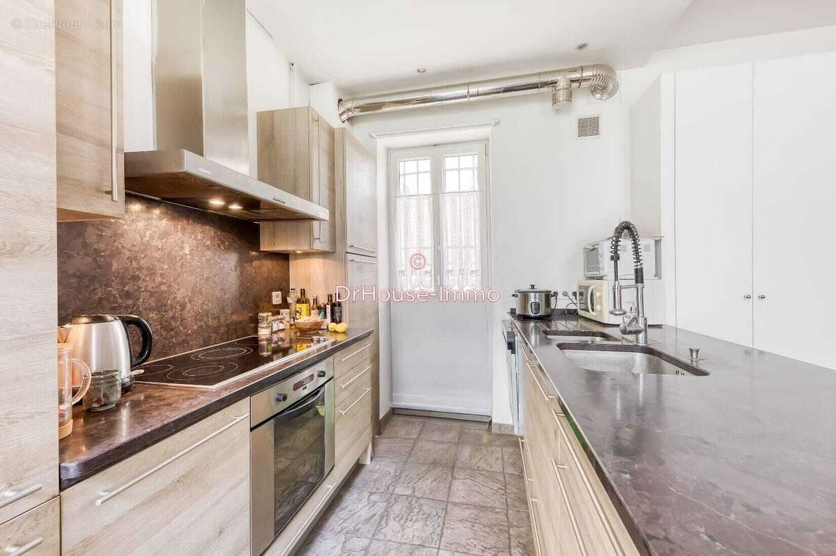 Appartement 87 m² à Paris-9e  - photo 6