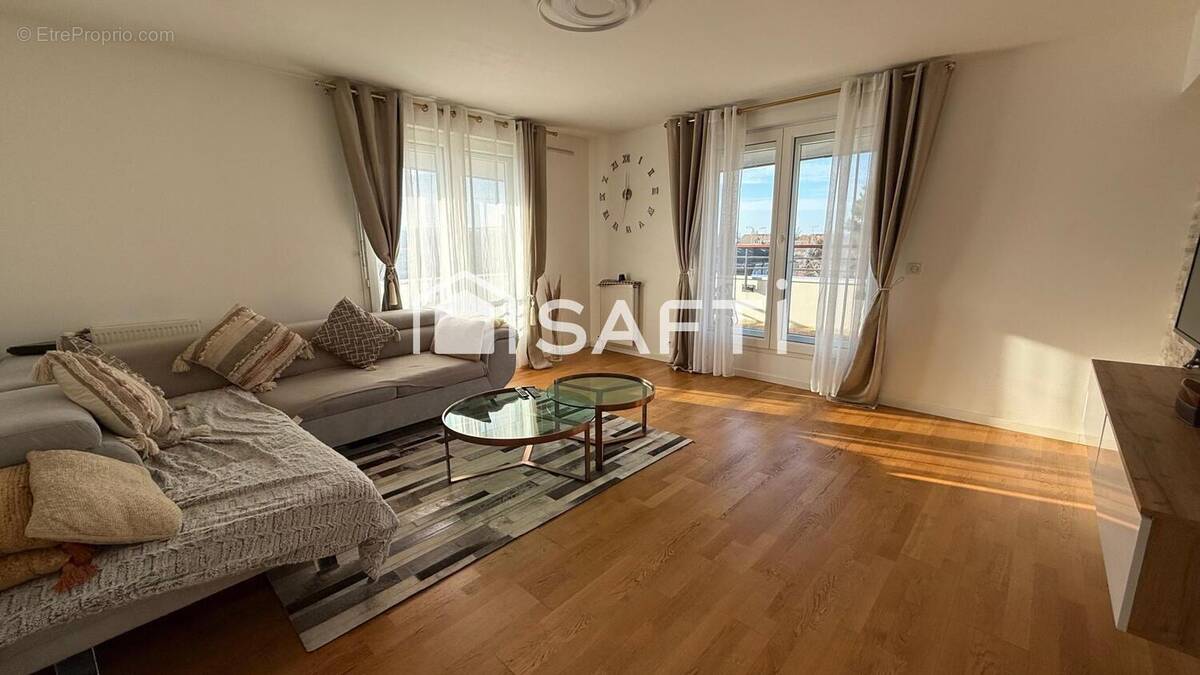 Photo 1 - Appartement à LES MUREAUX
