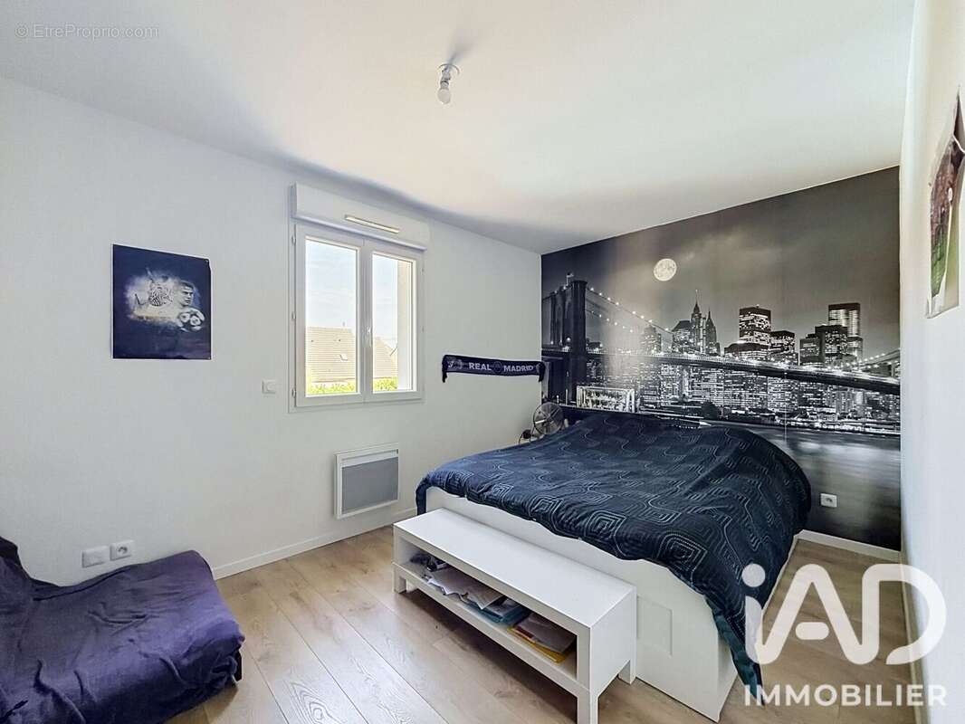 Maison 128 m² à Le Plessis-Bouchard  - photo 8