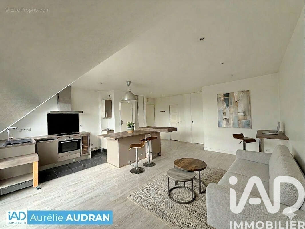 Photo 2 - Appartement à VOISINS-LE-BRETONNEUX